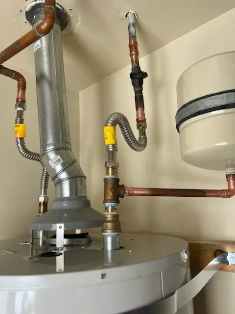 Water heater installation and plumbing repair in Lillyville